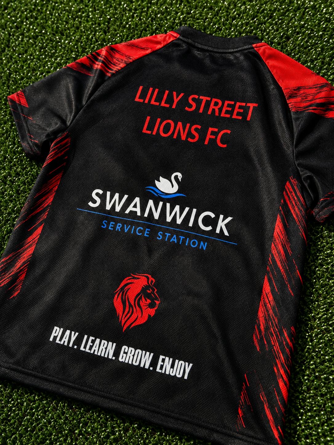 Lilly Street Lions FC black training top rear